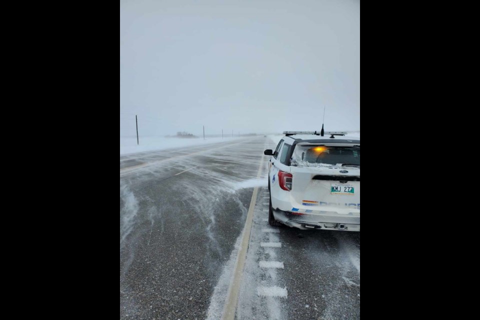 Blizzard conditions on Manitoba Highway.