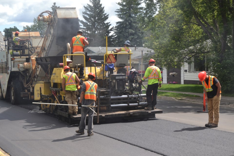 Crews from Zenith Paving in Brandon lay down new asphalt on King St. on July 5 as resurfacing work continues on three of Virden's major roadways. The upgrade is being cost-shared between the Town of Virden and Manitoba Infrastructure &Transportation; except for Thomas Dr. between King St. and PR 257 which is funded solely by the Province. 