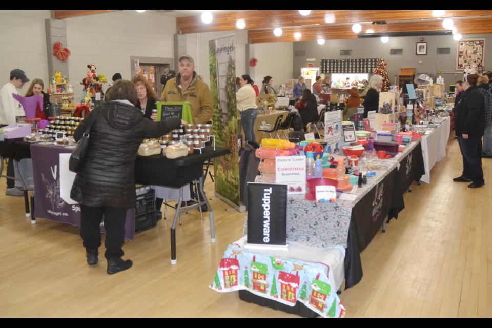 Shoppers in Virden's Legion hall peruse unique gifts.