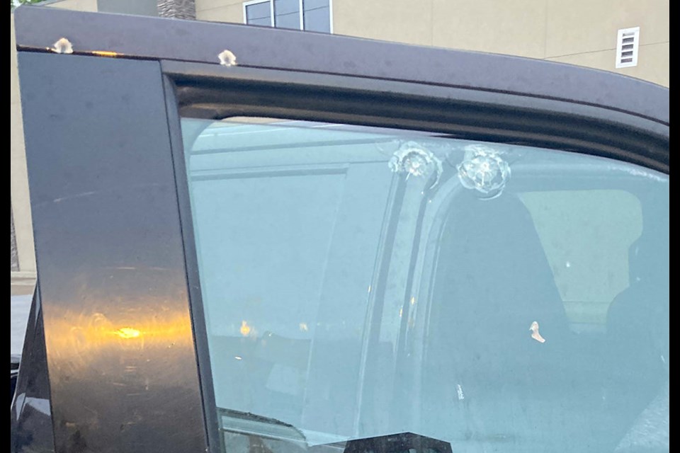 Firearm damage to victims vehicle