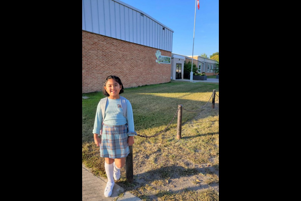 Our Back To School picture contest winner is a photograph of Zoyen Adana, an excited Grade 2. student taken on her first day of school at Goulter School, Sept. 7.
