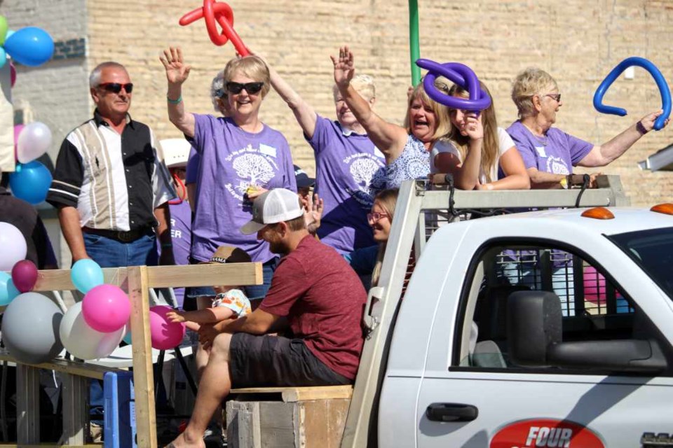 It’s reunion season and this one features the Bothe family riding in the Oak Lake parade. They are having fun!