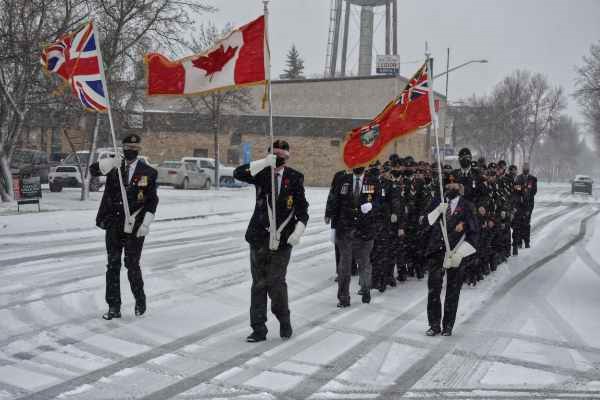 The Royal Canadian Legion, Virden Branch No. 8 Colour Party and members of C Battery, 1st Regiment of the Royal Canadian Horse Artillery parade down Wellington Street to the Virden Aud Theatre prior to the Remembrance Day service on Nov. 11. 