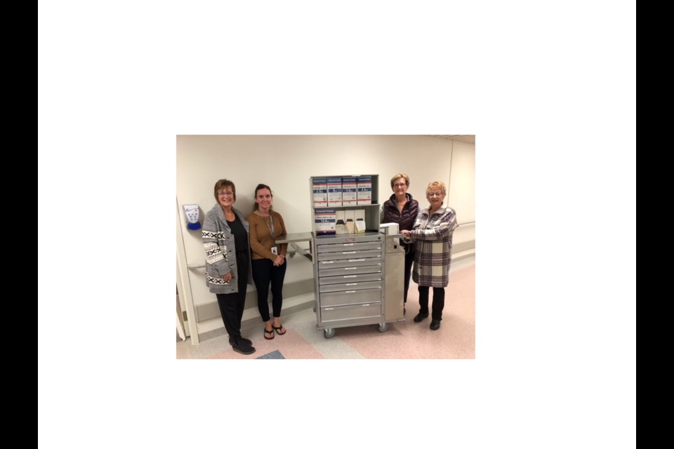 Donations from Elkhorn & Area Foundation helps Virden District Health Auxiliary to purchase a portable cast cart for the Virden Health Centre: Jill Canart, for Elkhorn Foundation, Stacey Wessing, Health Service Manager Virden Hospital, and Gwen Clarke and Marilyn Carruthers from the Auxiliary.  (Oct. 2023)