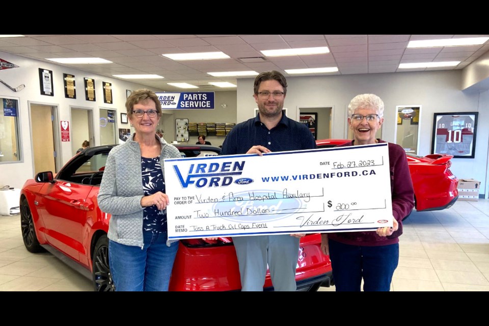 Proceeds from the Feb. 7 "Toss a Truck Oil Caps Event" were donated recently to the Virden & District Health Auxiliary. Presenting a cheque for $200 to Gwen Clarke and Glynis Danielson of the Health Auxiliary is Darren Banga representing Virden Ford.