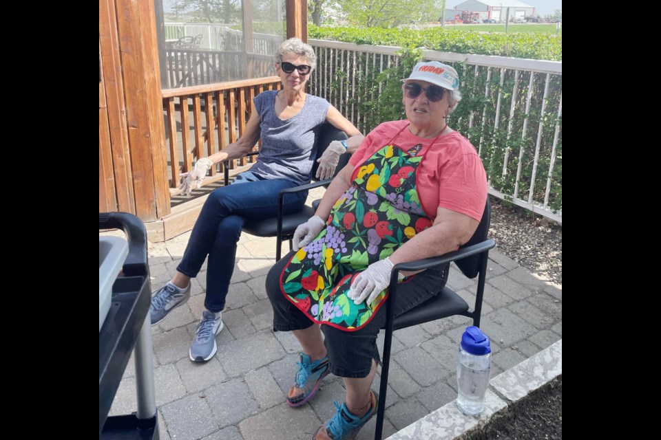 Janis Lobreau and Auralee Leadbeater barbequed for the Hike for Hospice.