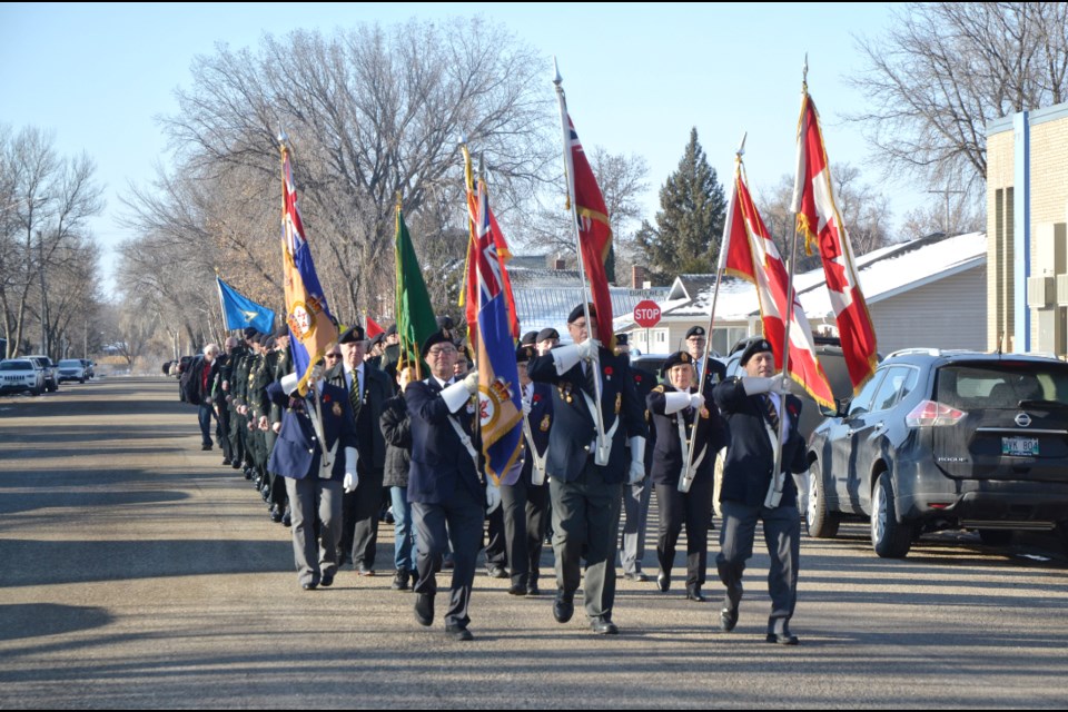 A Royal Canadian Legion Virden Branch No. 8 Colour Party leads dignitaries on parade down Wellington St. prior to the 2023 Remembrance Day Service at the Aud Theatre. 