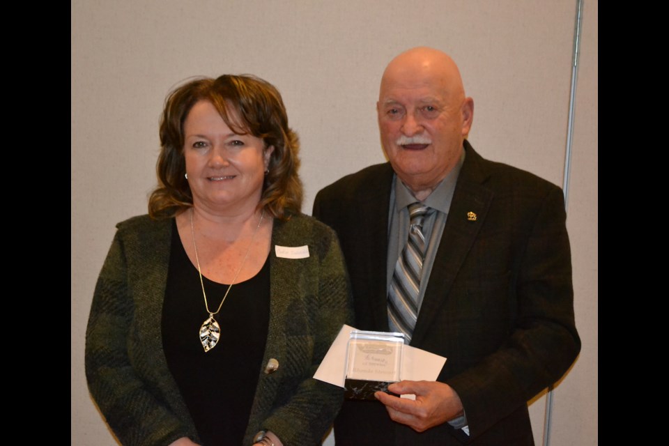 Mayor Wright presents CAO Rhonda Stewart with recognition for 30 years of service. Stewart began her career as Assistant Secretary-Treasurer in March of 1991 and during her tenure has served under eight different mayors and nine councils.