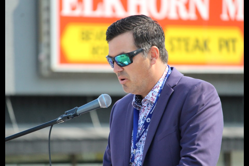 Reeve of the RM of Wallace-Woodworth Clayton Canart addresses the Elkhorn Homecoming crowd on Aug. 5. Along with the area's history, there were announcements of new grants for community projects.