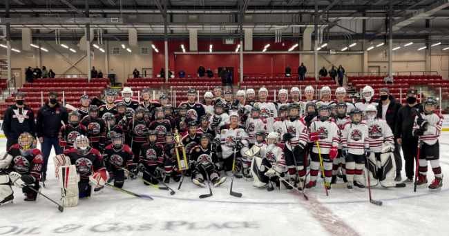 Virden U11 Junior Oil Capitals teams, backed by MJHL Oil Capitals and alumni players, coaches/staff 