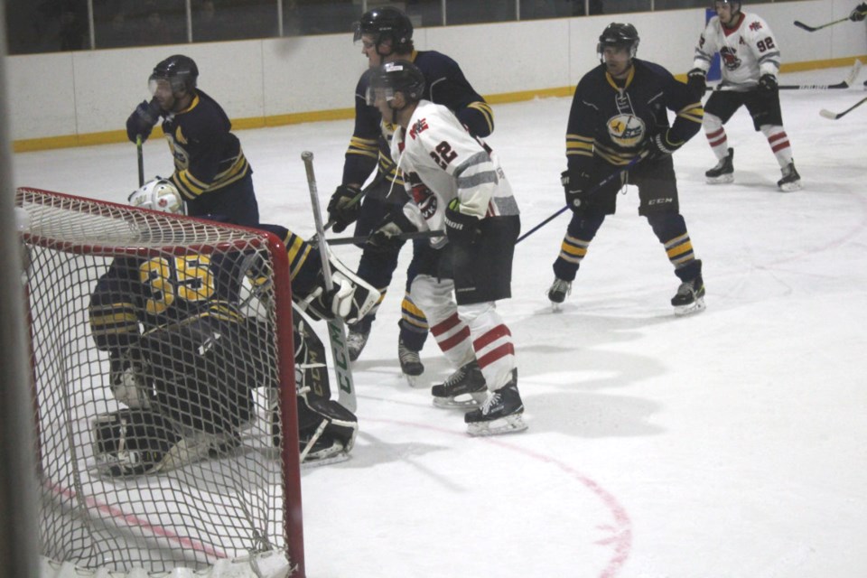 Miniota/C-Hawks #22 Josh Martin in position at the Rivers Jets net, Tuesday Feb. 28 in Elkhorn.
