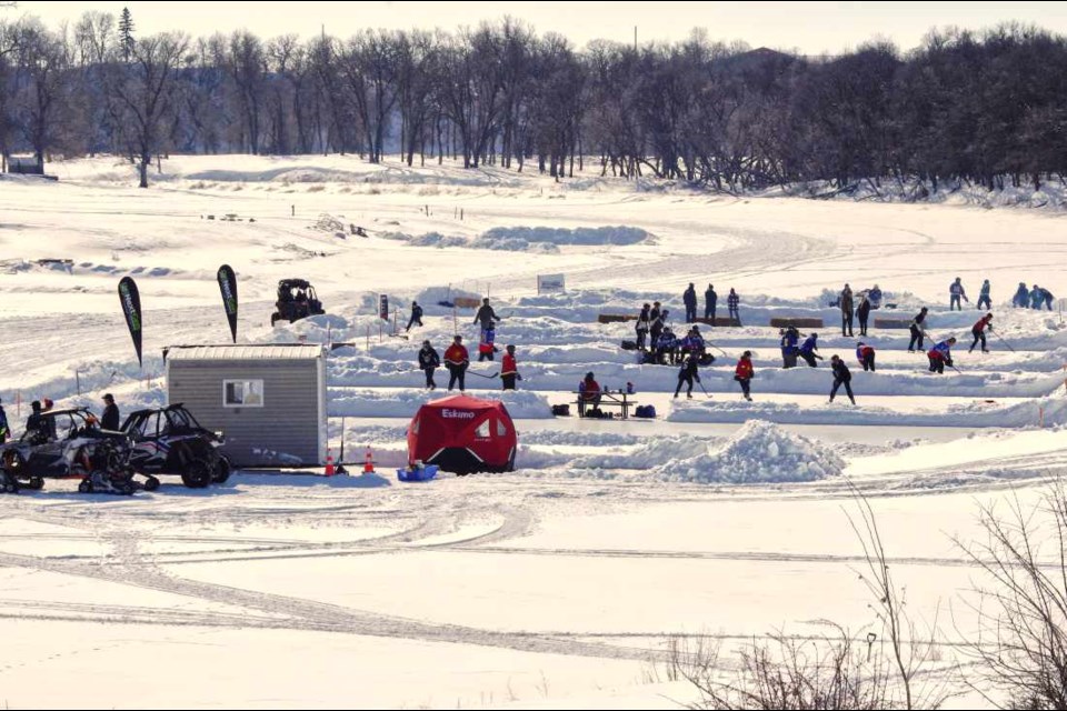 A frozen Souris River at the end of February makes for a great rink for a shinny tournament. PHOTO/DIANE WINTERS