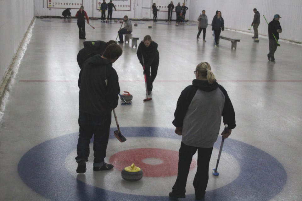 Oak Lake bonspiel is underway Friday, Feb. 10, filling the three-sheet rink. Burger sales were rivaled by pie sales before the curlers ventured out. 
A two-man spiel will be held in the rink on Feb. 17 and 18. With just a skip and a lead, six rocks per end and six ends per game, there won’t be much time to lean on the broom. 
