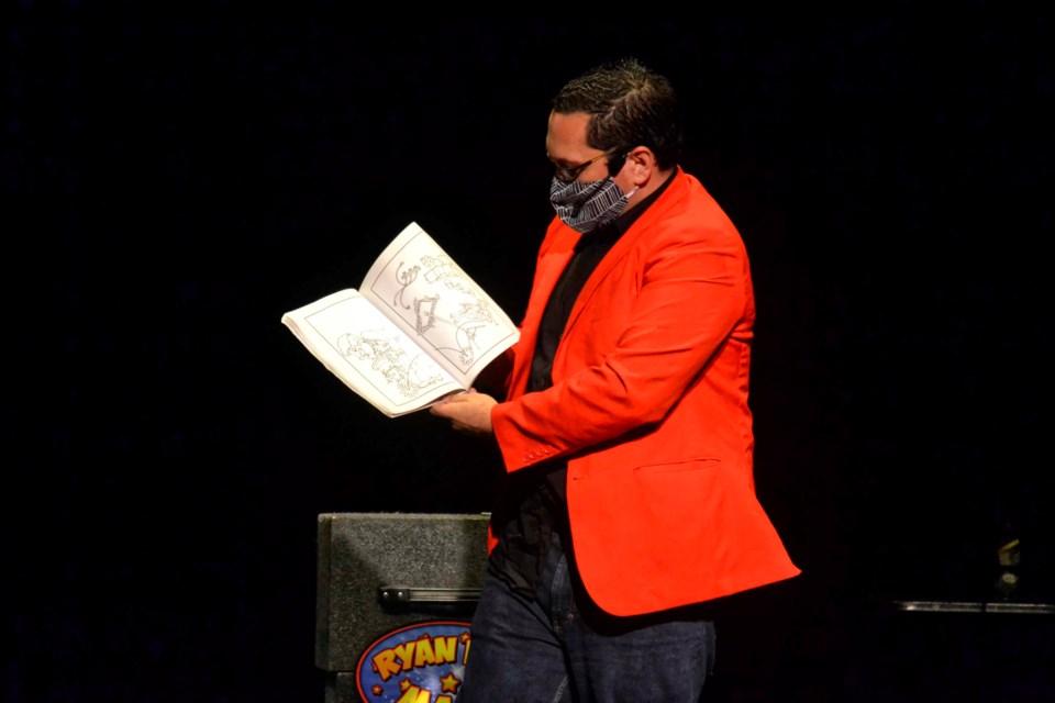 The colour on the colouring book pages "disappears" during Ryan Price's magic matinee on Oct. 23 at the Virden Aud Theatre. The Winnipeg magician performed for local youngsters as part of the Town of Virden's Manitoba 150 celebrations.