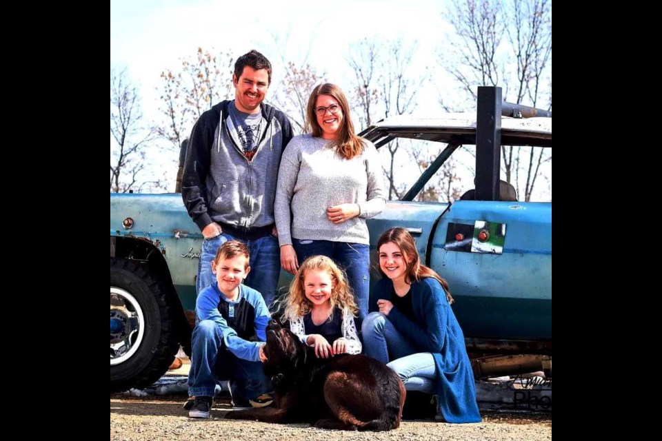 Chris Flannery, his wife Becky and children (l-r): Deegan, Aleeah, Emily and their dog, Molly.