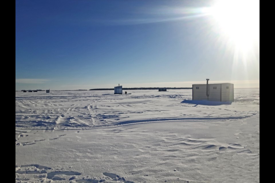 The cold but sunny scene on the frozen Oak Lake where the 11th annual Fishing Derby is underway on Jan. 28. 