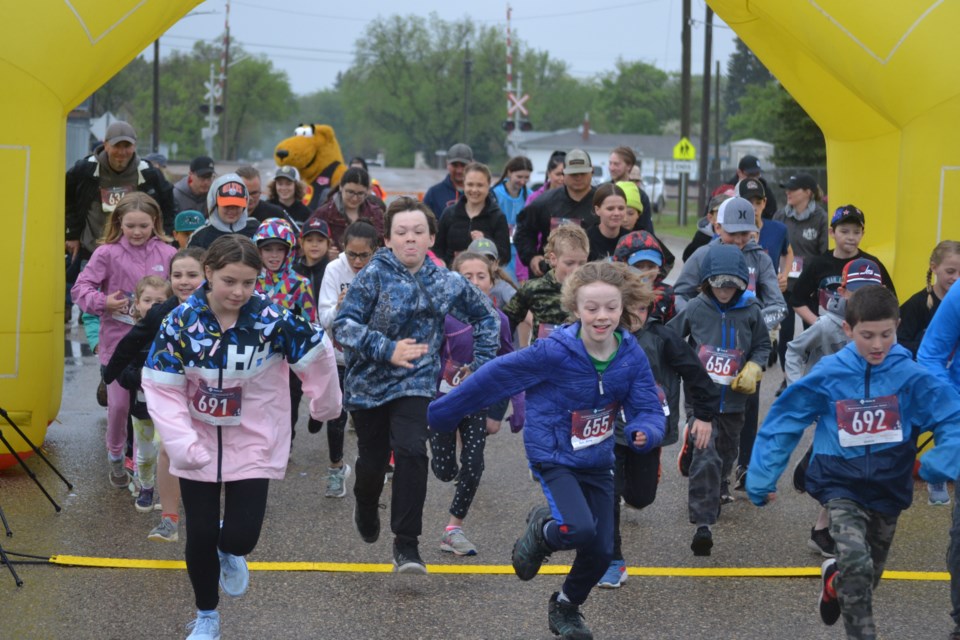 Participants in the 3 km Family Fun segment of the 10th Annual Virden Run on May 29 head off from the starting line on Lyons Street last Sunday, May 29
