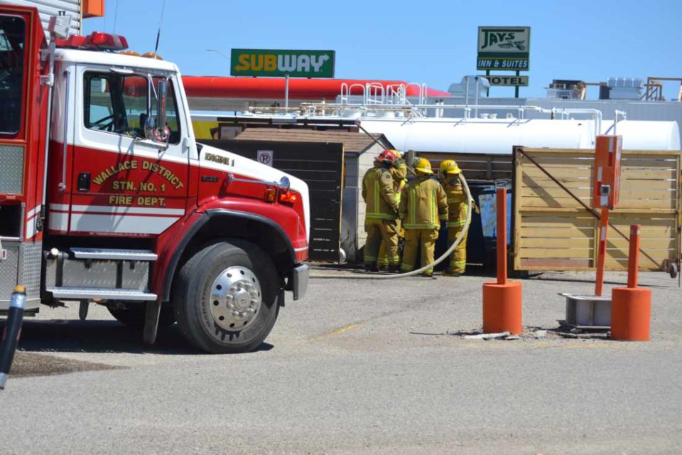 Wallace District Fire Department Station 1 firefighters extinguished a fire in the garbage dumpster at the rear of the A & W Restaurant on the Trans-Canada Highway service road on a windy Wednesday afternoon, June 1.