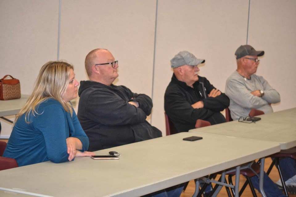 - Jillian Irvine, left, Craig Lane, Mayor Murray Wright and Coun. Grant Gardiner listen as Town of Virden Economic Development Manager Liza Park presents an overview of the Manitoba Oil Museum project during the Community Conversation evening on June 13. 