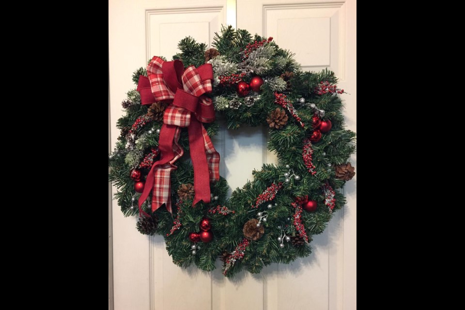 A custom made Christmas wreath from Flower Attic & Gifts on Virden’s Seventh Ave.