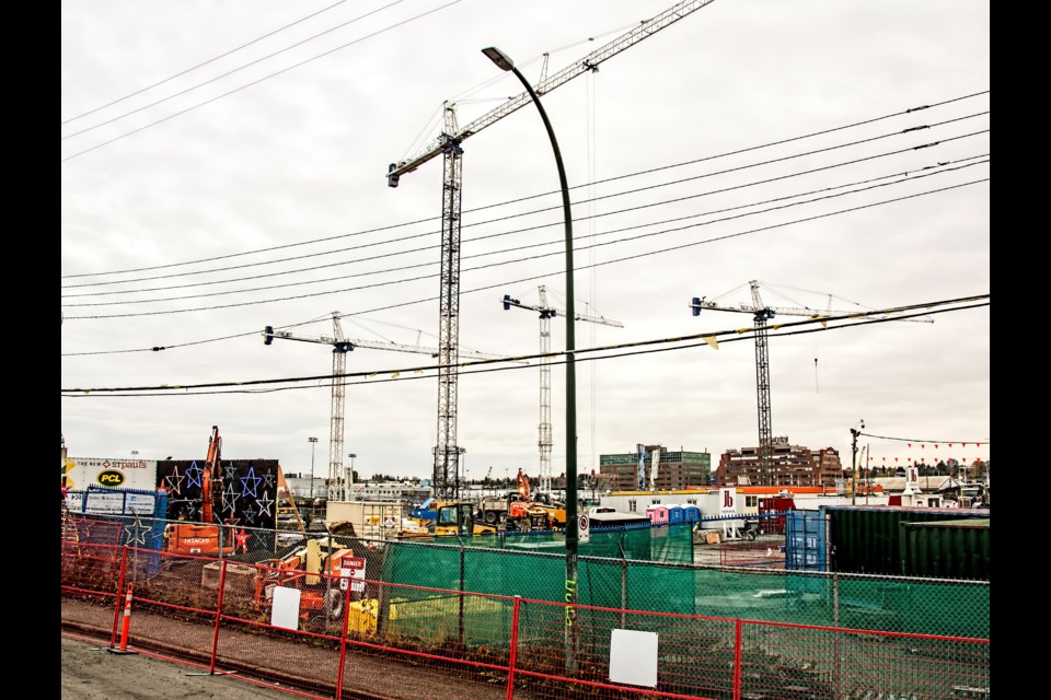 Construction cranes in action at the False Creek Flats in November 2022. | Chung Chow 