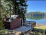Fawn Lake: 10-acre waterfront parcel with two cabins in the Cariboo.| LandQuest Realty