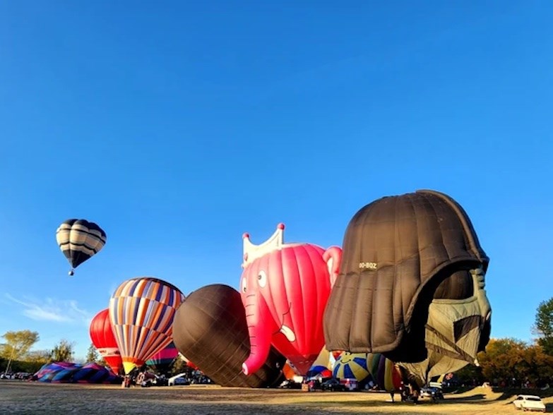 The 10th Anniversary of the Heritage Inn International Balloon Festival saw "Coulee Balloon" flown by Willy Taillon of Medicine Hat, get in the air before the rest. | Dana Zielke 