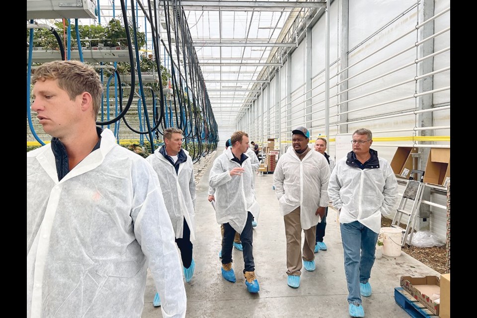 Agricultural scholars from around the world recently visited Sunterra’s 20-acre greenhouse operation in Acme, Alta. | Photo by Steve Laroque

